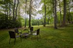 Watch the stars while sitting by the fire pit